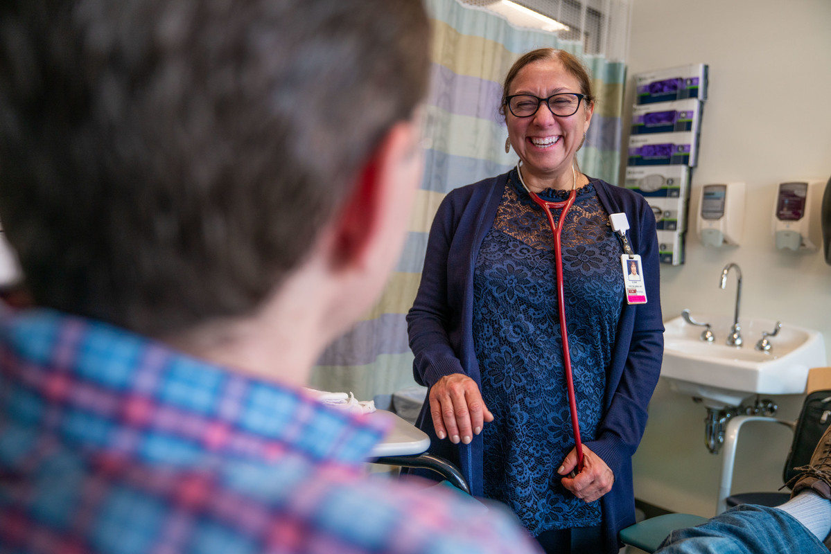 Doctor talking with patient