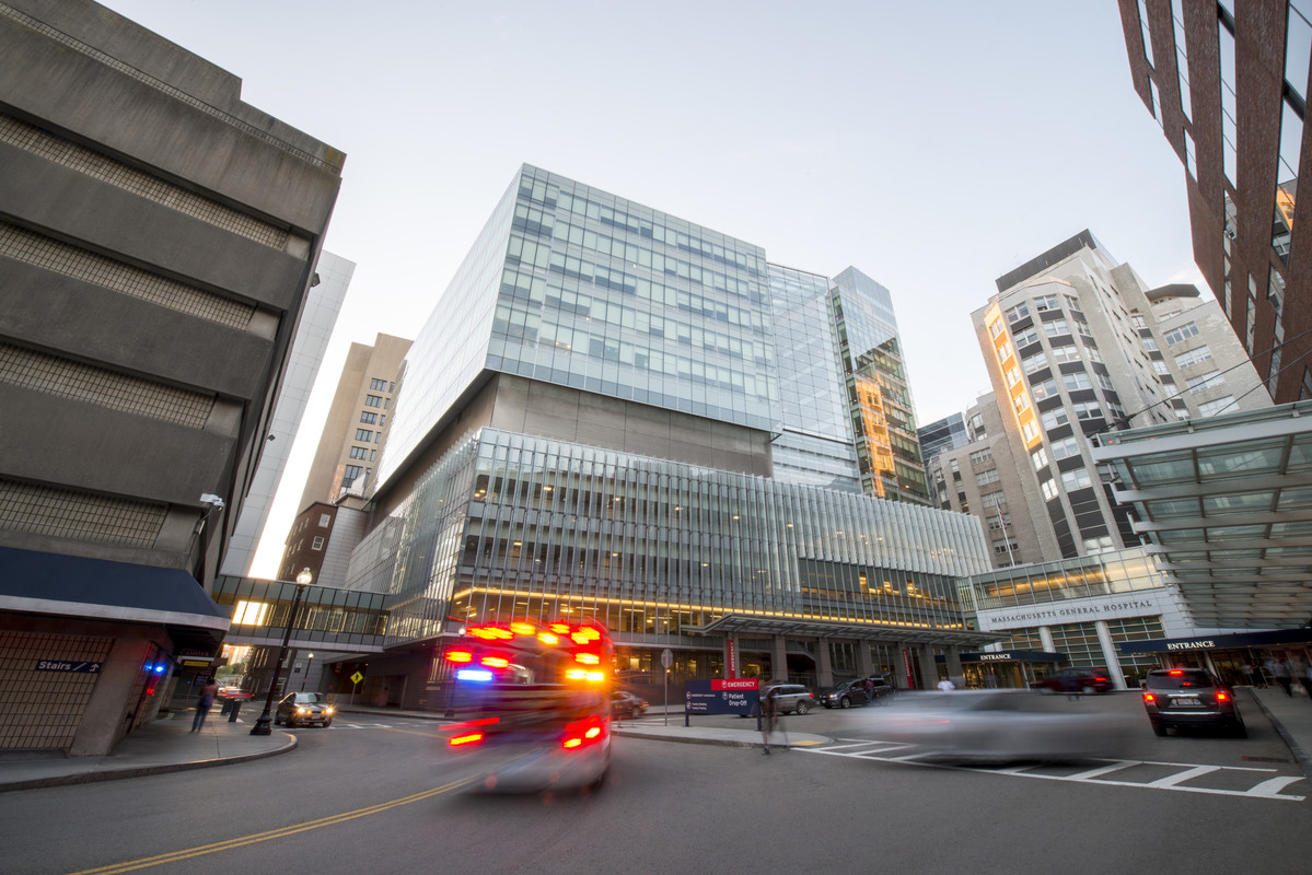 The Lunder building with a speeding ambulance