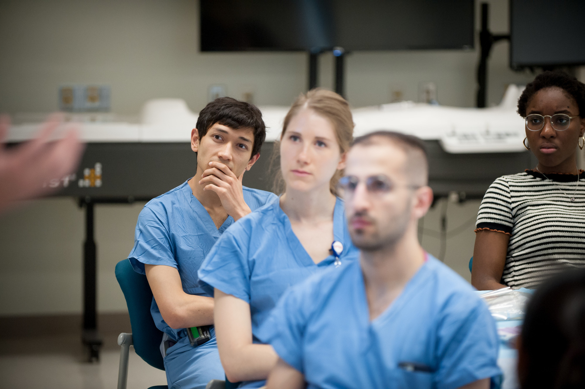 residents listening to lecture