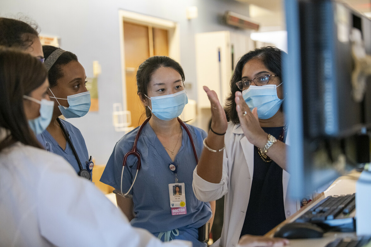 Doctor speaking to residents