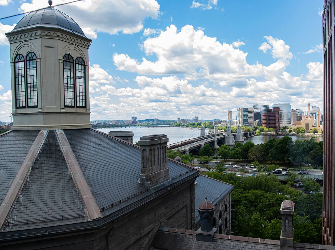 The view from the Howard Ulfelder, MD, Healing Garden on the eighth floor of Mass General’s Yawkey Center for Outpatient Care, looking over the Longfellow Bridge toward Kendall Square — “the most innovative square mile on the planet.”